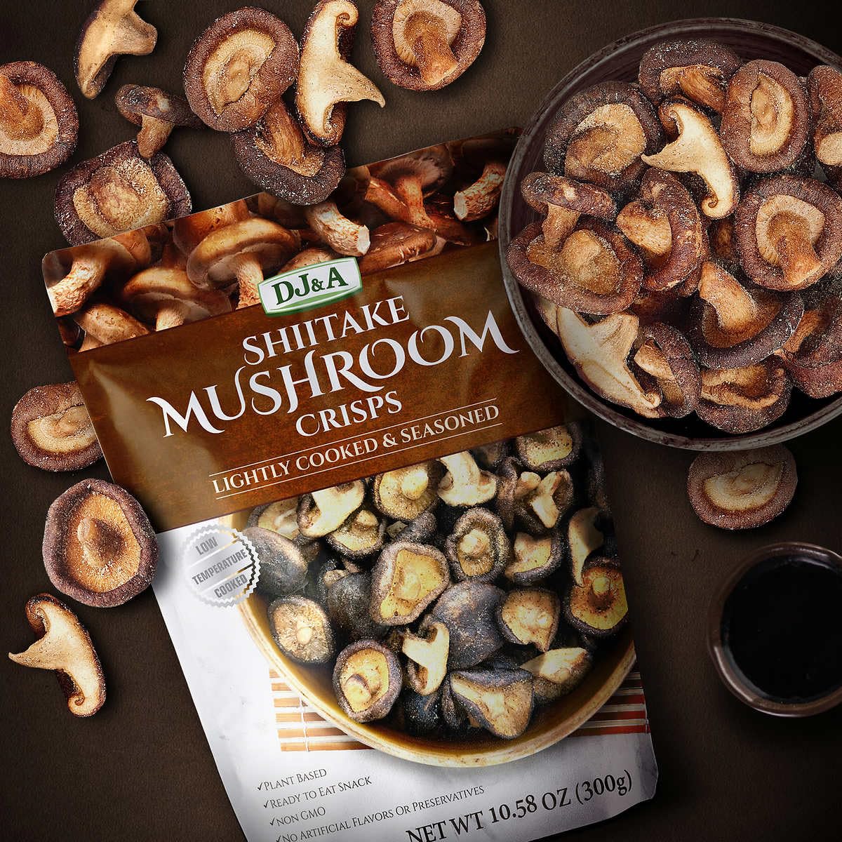 DJ&A Shiitake Crisps served with cheese on a board suggesting pairing ideas.
