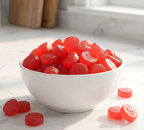 Close-up of DM Sweets Cherry JuJu soft-chewy texture in a bite-sized candy form.