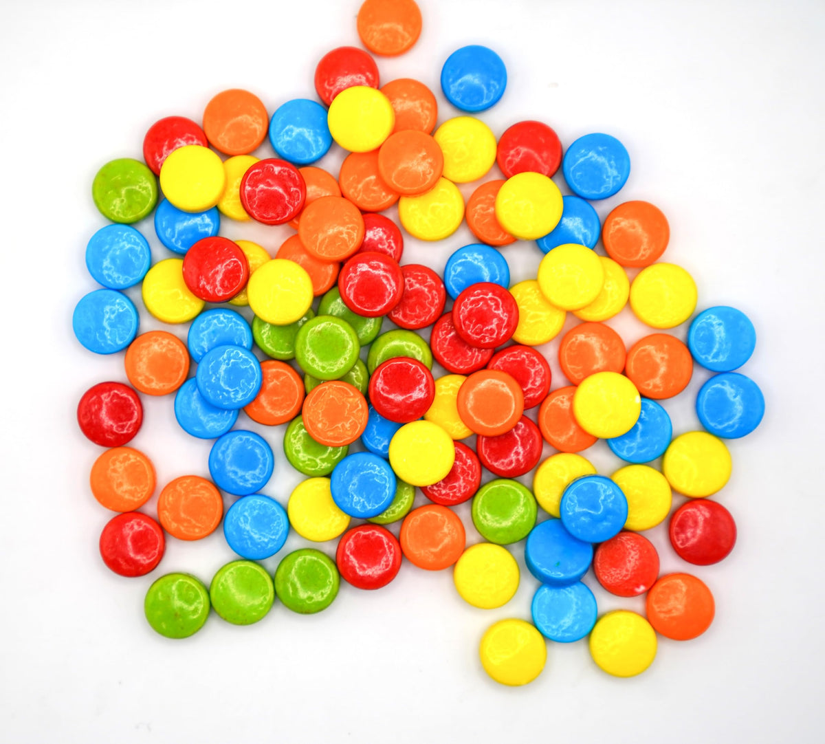 Close-up of DM Sweets tangy fruity candy pieces in bright colors