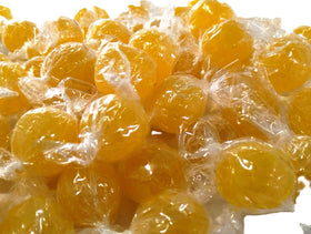 DM Sweets jumbo lemon candy balls one-inch size, easy to pop.