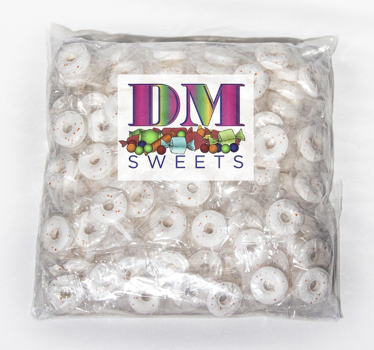 DM Sweets Orange Mints wrapped for on-the-go freshness and shareable treats.