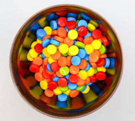 DM Sweets vending refill candy bag featuring colorful pieces