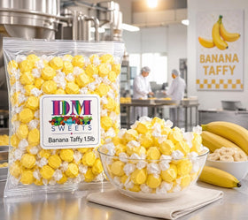DM Sweets Banana Taffy soft chew closeup, showcasing creamy texture and bright flavor.