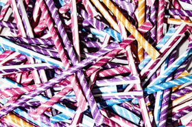 DM Sweets individually sealed candy straws for clean, mess-free sharing.