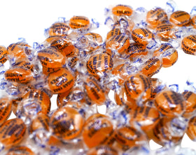 DM Sweets sugarfree butterscotch discs in serving dish for sharing.