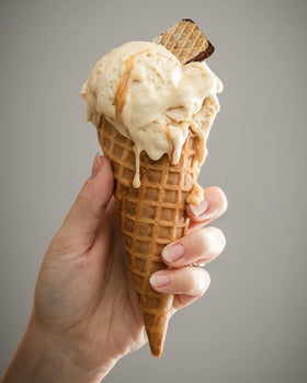 Dolcetto Cubetti lemon cream wafer cookies close-up, crisp layers for a refined dessert or snack.