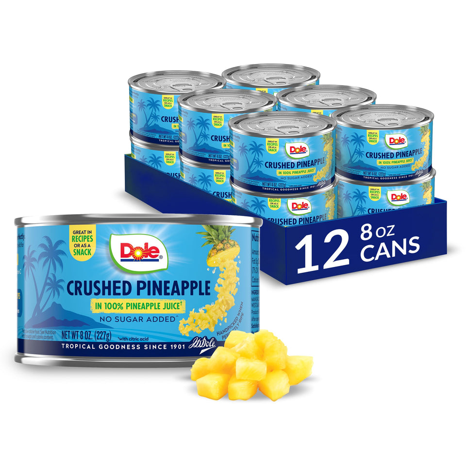 Dole crushed pineapple in 100% juice can, convenient snack-ready.