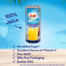 Pouring Dole pineapple mango juice into a glass, tropical aroma.