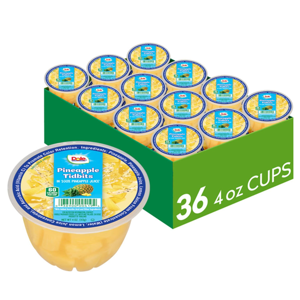 Dole Pineapple Tidbits in 100% Juice cups for quick, refreshing snacks.