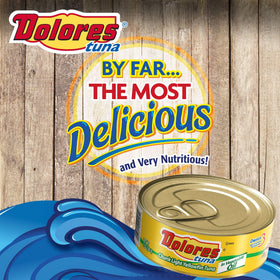 Dolores canned tuna with oil glistening emphasizes flavor-packed, ready-to-eat protein.