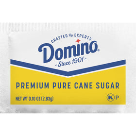Dispenser box keeps Domino sugar packets accessible for quick refills.