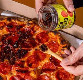Don Chilio hot habanero chili crisp on eggs elevates morning flavor with spice.