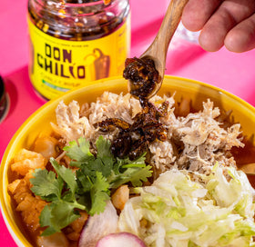 Don Chilio Mild Jalapeño Chile Crisp on pizza for a peppery crunch