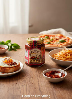 Don Emilio Salsa Macha Extra Hot drizzle shot over pizza adds vibrant color and heat.