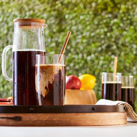 Concentrate being diluted to taste for personalized strength.