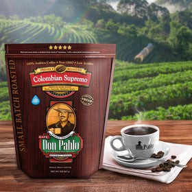 Cafe Don Pablo coffee beans in close-up releasing rich aroma.