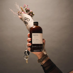 Pour Dona Masala Chai concentrate from bottle for iced drinks