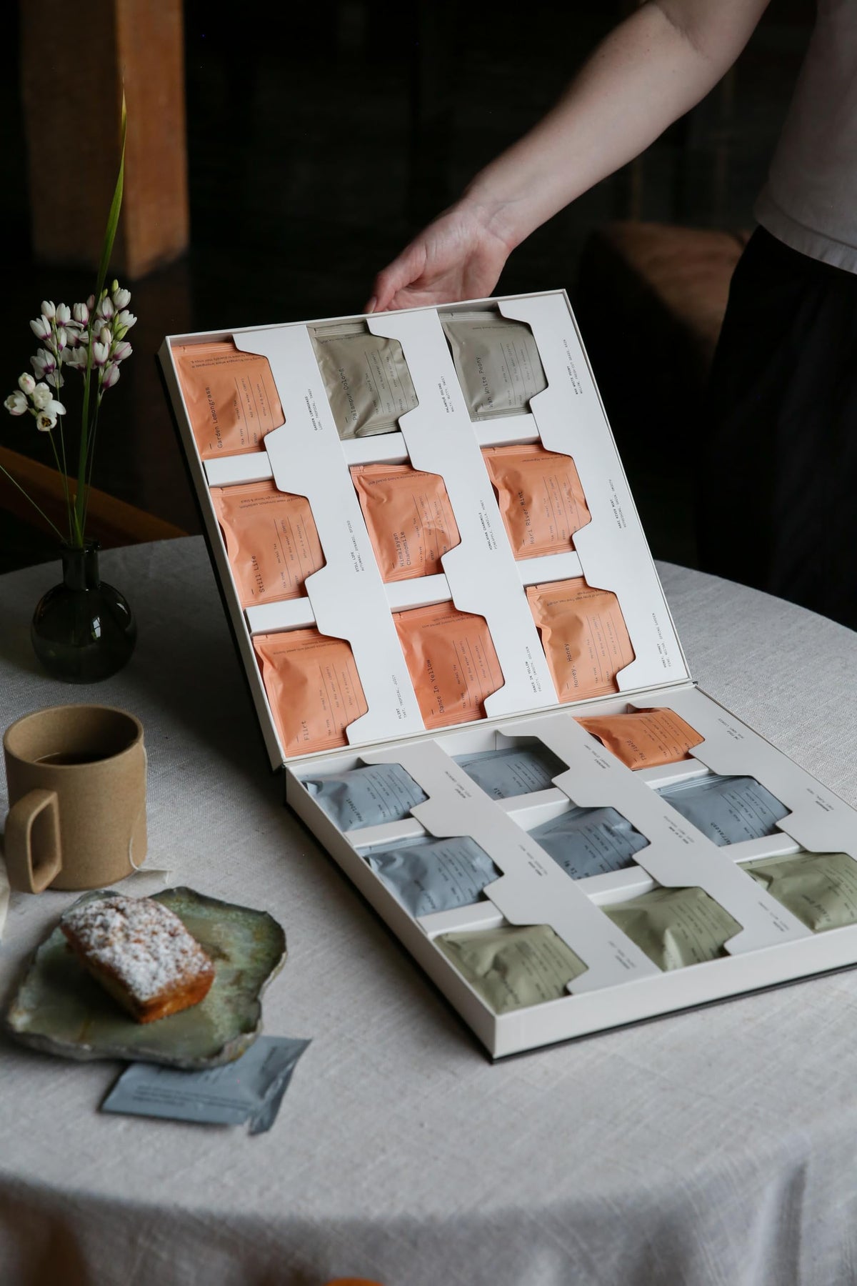 Dona Tea Library packaging emphasizes sustainability with compostable sachets.