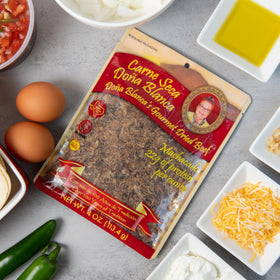 Kosher sea salt seasoning visible in Doña Blanca carne seca product photo.