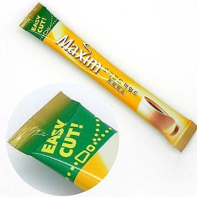 Dongsuh Maxim Mocha coffee stick pack back view, features 100 sticks for easy daily use.
