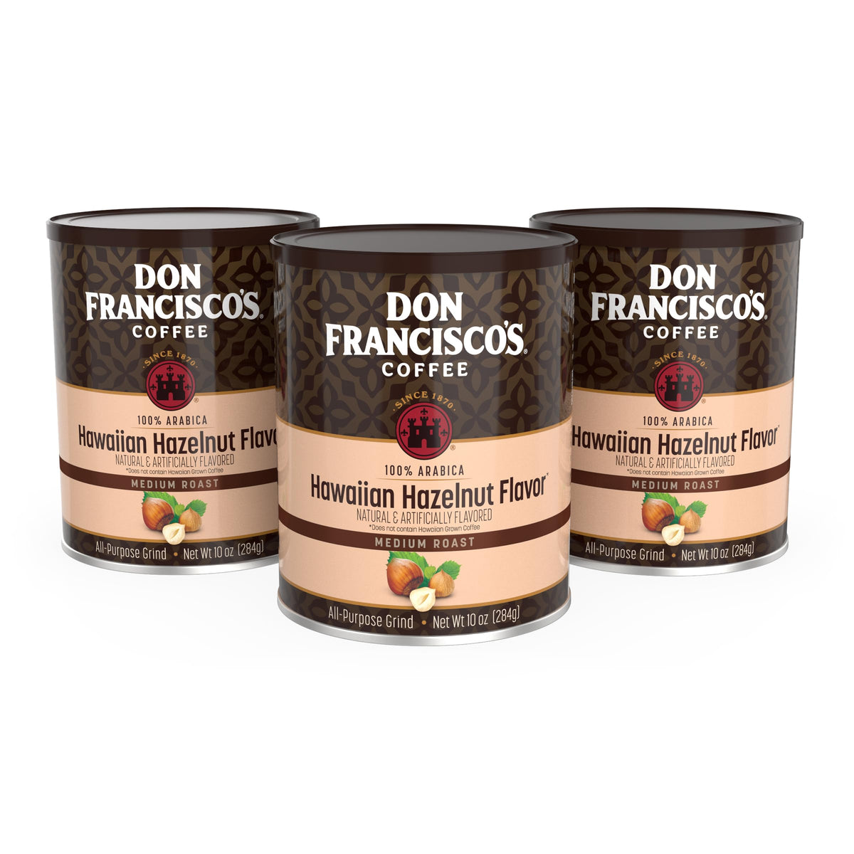 Don Francisco's Hawaiian Hazelnut ground coffee cans on shelf highlight freshness.