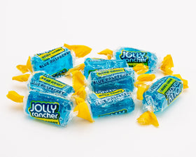 Donty-Tonty Blue Raspberry candy on an office desk for quick treats.