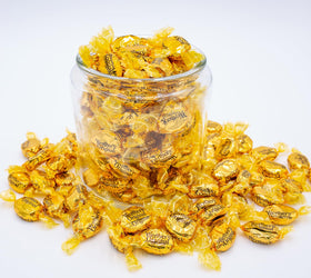Donty-Tonty ORIGINAL hard candy caramel swirl closeup emphasizes smooth texture and melt-in-mouth moment.