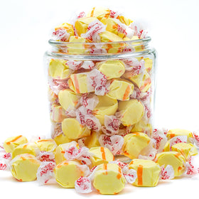 Bulk display of Donty-Tonty banana taffy ready for shelves and checkout.