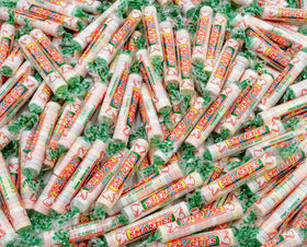 Donty-Tonty X-TREME SOUR candy rolls in assorted flavors, perfect for bulk party treat tables.