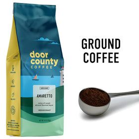 Door County Coffee Amaretto ground coffee being poured, releasing warm aroma