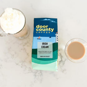 Door County Coffee Irish Cream ground coffee pour releasing creamy aroma