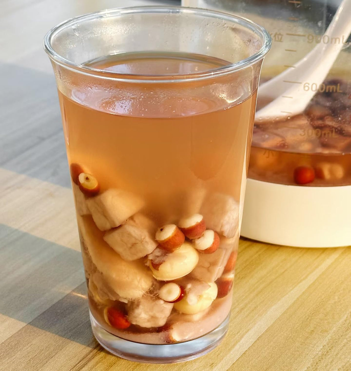 Doorpetal lotus seeds in congee with rice for a hearty meal.