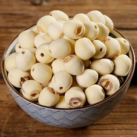 Doorpetal lotus seeds with core removed shown on label.