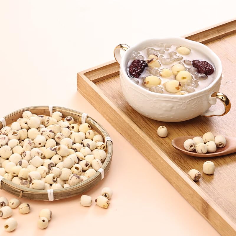 Doorpetal lotus seeds simmering in a pot for tender congee.