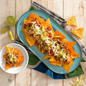 Doritos Nacho Cheese chips with dip, perfect for dipping.