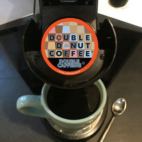 Office breakroom setup with Double Donut 2x caffeine pods ready to serve.