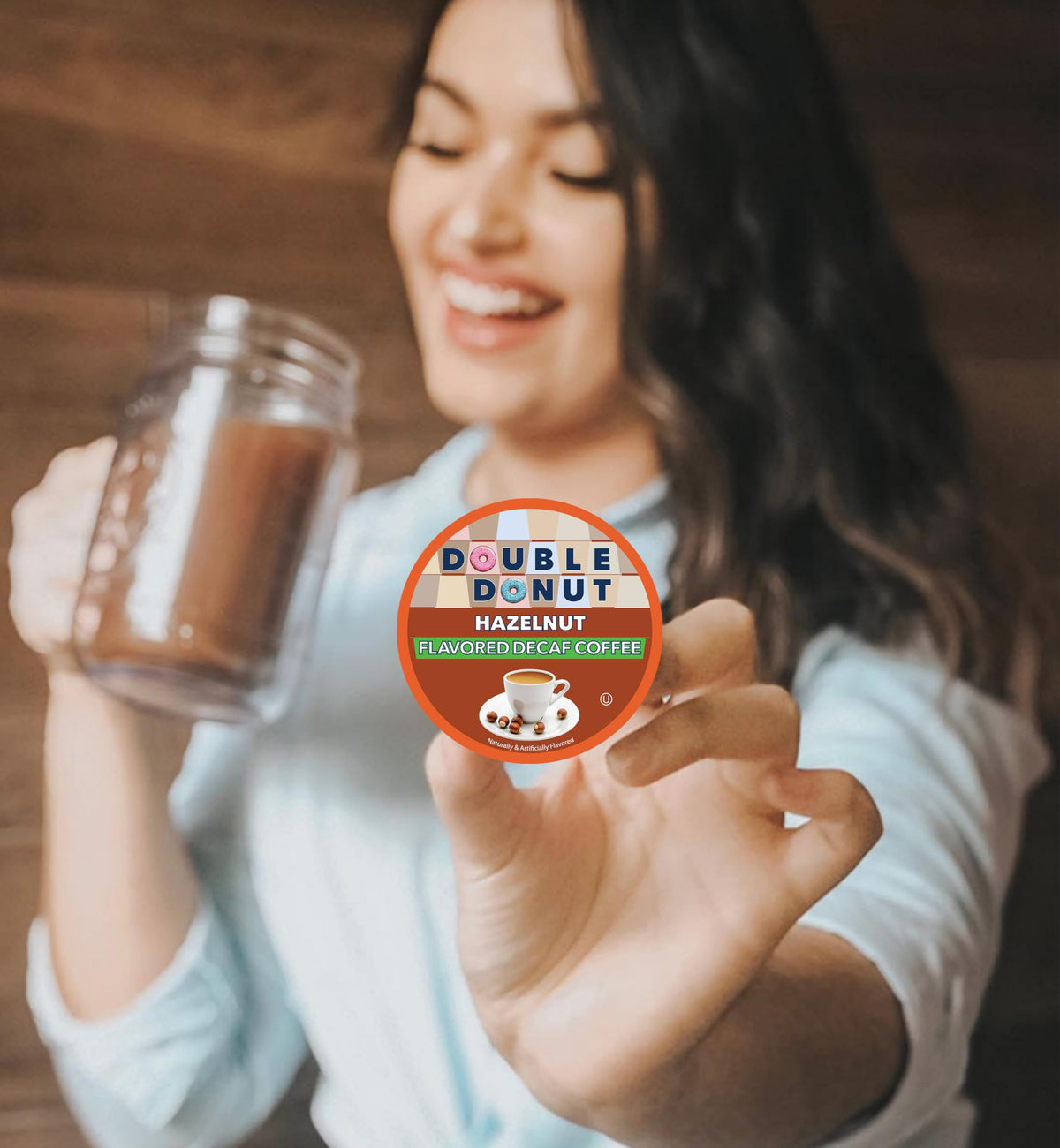 Pouring hazelnut decaf into a mug for a cozy evening.