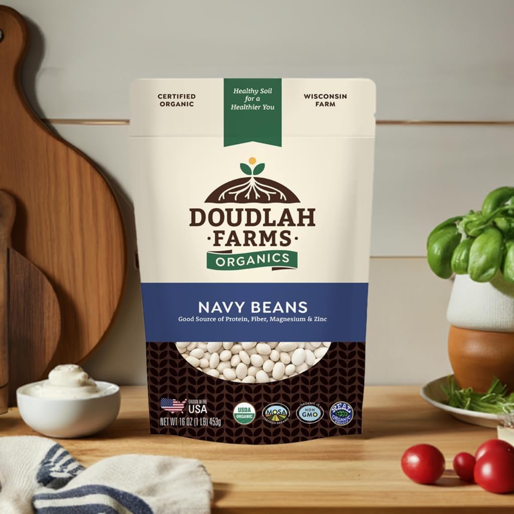 Doudlah Farms Organic Navy Beans being measured, pantry staple for weeknight dinners