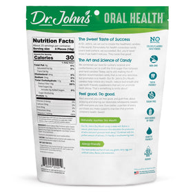 Dr. John's Candies Dry Mouth Drops orange bottle highlights zesty taste and saliva support.