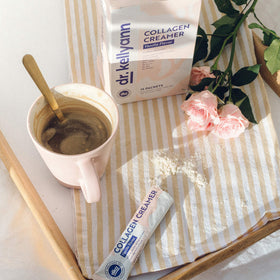 Pouring Dr. Kellyann Keto Coffee Creamer Vanilla into coffee for a smooth energy-boosting cup
