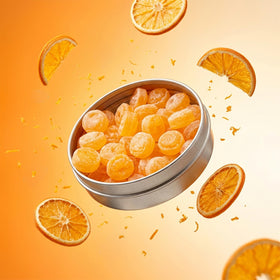 Dr. Variety Retro Sours Tangerine Drops tin open with candies ready for shareable portions.