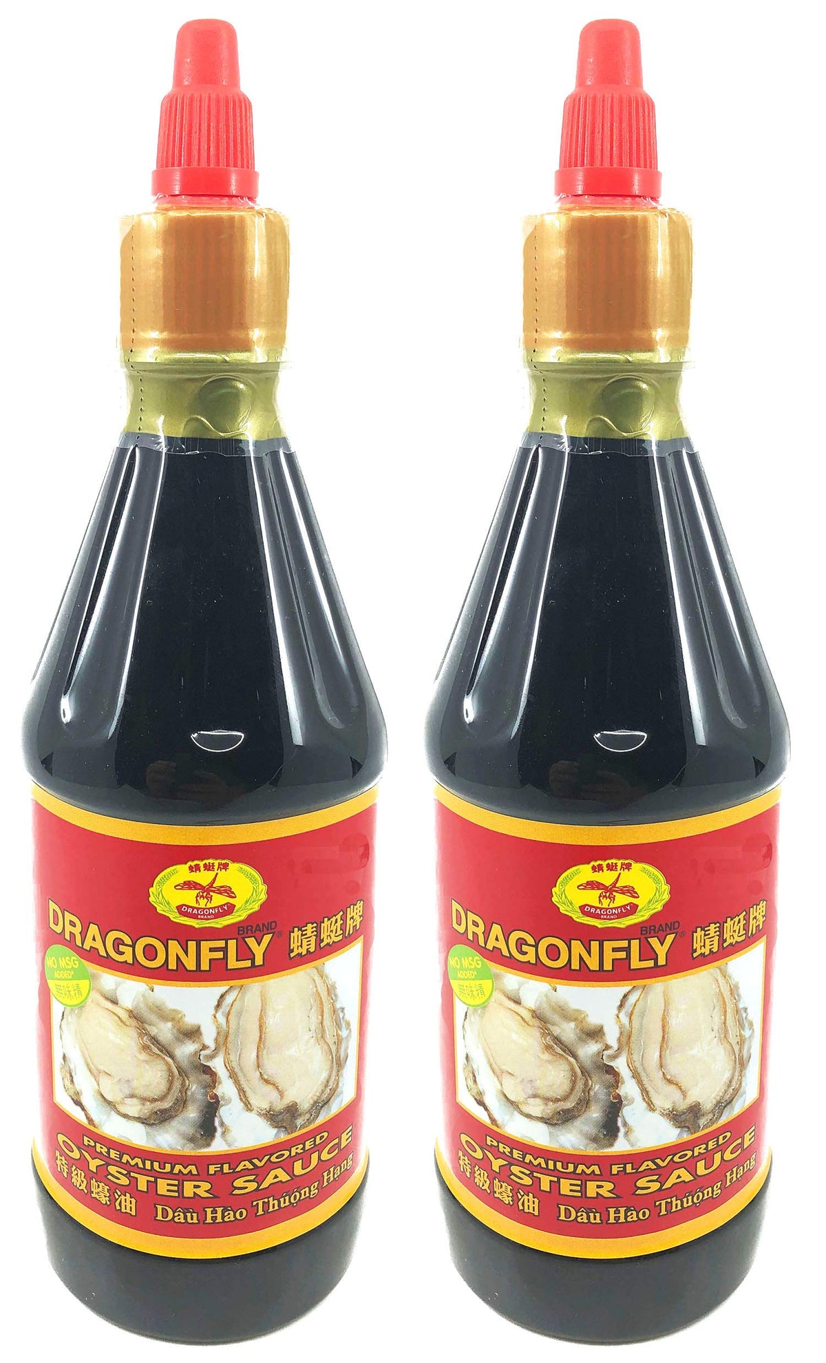 Dragonfly Premium Oyster Sauce bottle pouring to add rich savory depth