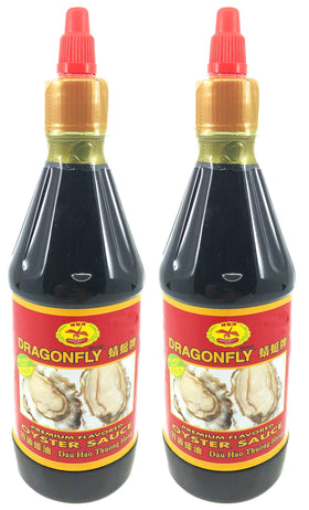 Dragonfly Premium Oyster Sauce bottle pouring to add rich savory depth