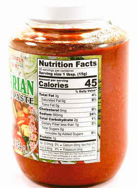 Dragonfly Tom Yum Paste label close-up with vegetarian certification and Thai origin.