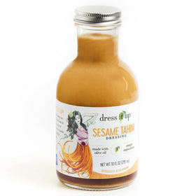 Dress It Up Sesame Tahini Dressing bottle on a counter, ready to upgrade greens.