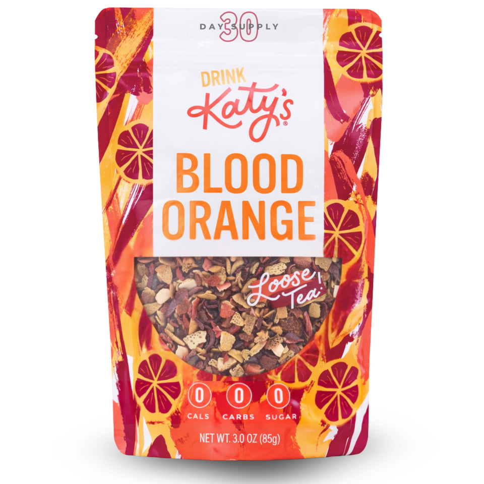 DRINK KATY'S Blood Orange loose tea pour showcases bright citrus aroma for a refreshing cup.