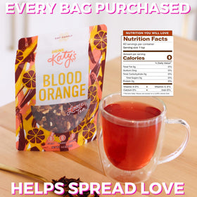 DRINK KATY'S Blood Orange tea served with garnish suggests versatile citrus mocktails.