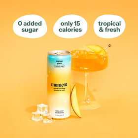 Moment Botanical Soda being poured into a glass, signaling a refreshing non-alcoholic option.