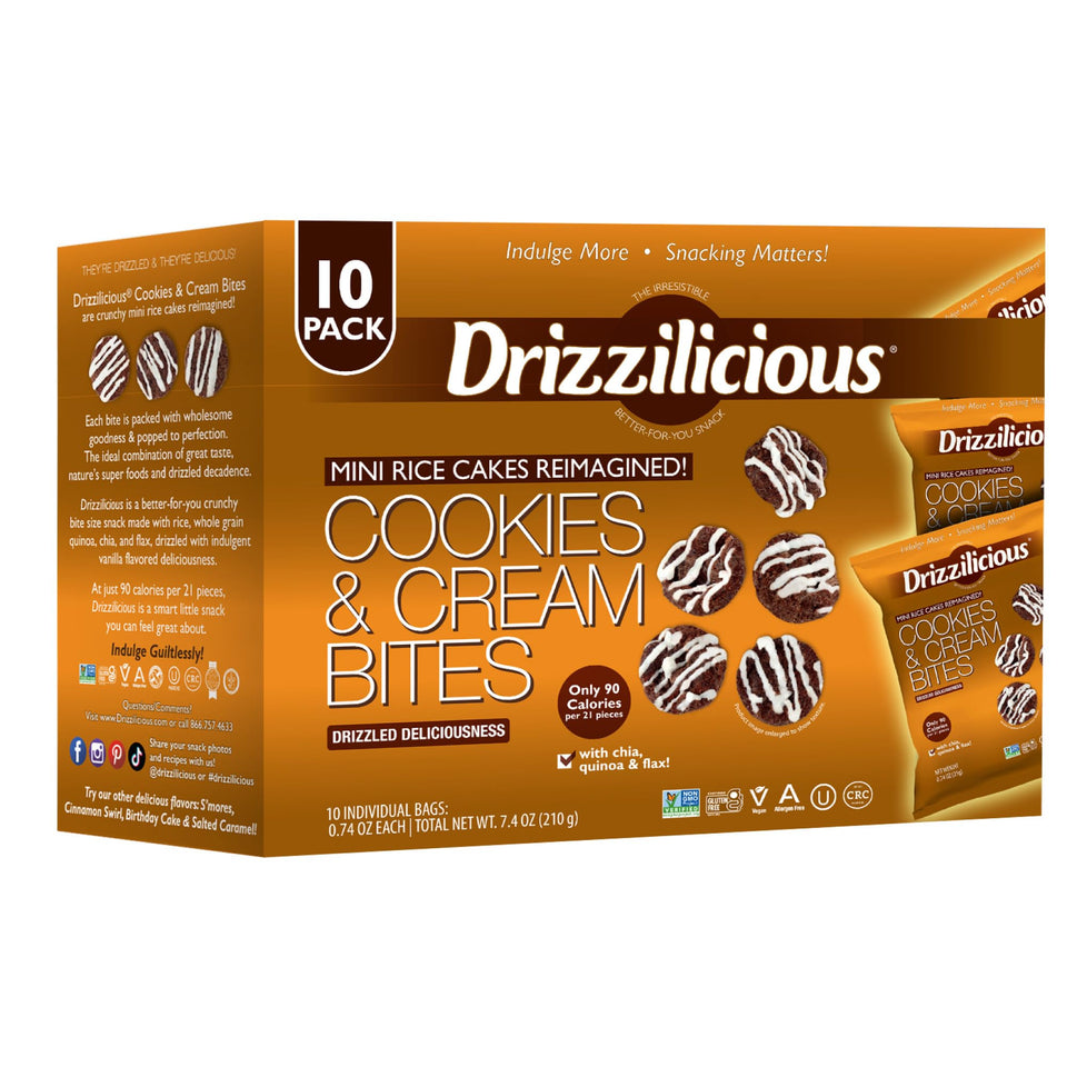 Drizzilicious Cookies and Cream mini rice cakes close-up with white drizzle, tasty vegan snack.