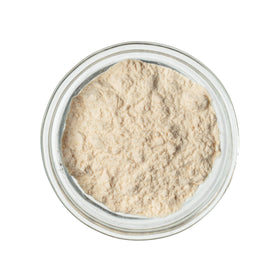Druids Grove soy milk powder being reconstituted for smooth blends.